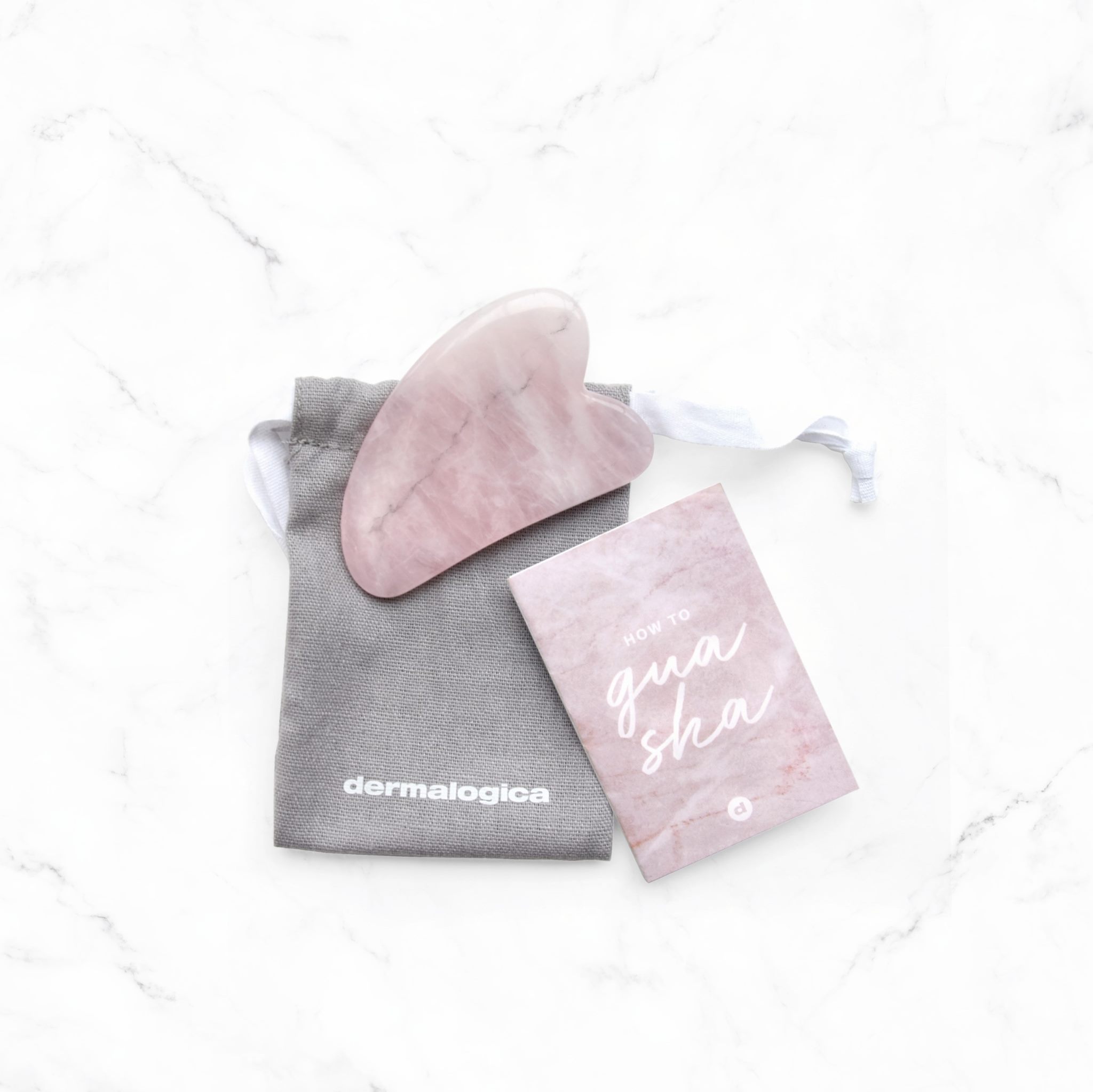 The Rose Quartz Gua Sha Stone with NEW Photo Nature Firming Serum.